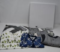 One as new Monica + Andy organic hooded towel. One as new Monica + Andy Racerback Santa Fe cactus