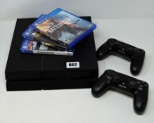 A pre-owned Sony PlayStation 4 PS4 500GB Original Matte Black CUH-1215A with two wireless