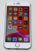 A pre-owned Apple iPhone 6s (Global/A1688) 32GB in Silver (iCloud activation lock clear, scratches