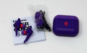 An as-new pair of Skullcandy Indy Evo True Wireless Earbuds in Lucky Purple with accessories and