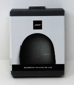 A boxed as-new Bose Headphones 700 Charging Case. Box sealed, cosmetic damage to box.