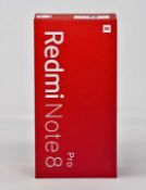 A boxed as new Redmi Note 8 Pro M1906G7E 64GB in Ice Emerald (Box opened, requires UK plug