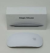A boxed pre-owned Apple Magic Mouse 2 (boxed opened, cosmetic wear to mouse and packaging).