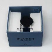 A boxed as new Skagen Falster 3 Smartwatch DW10S1 in Silver with Blue Silicone Mesh Strap (Box