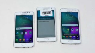 Three pre-owned Samsung Galaxy A3 SM-A300FU 16GB in White (FRP clear, All with cosmetic damage,