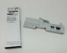 Five boxed as new Allen-Bradley 1730-TOP Point I/O 1734-TM-SC-2-4AN-01 Terminal Bases.