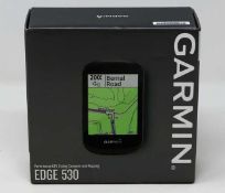 A boxed as-new Garmin Edge 530 GPS Cycle Computer. Box opened.