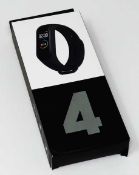 Four boxed as new Smart Bands.