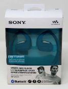 A boxed as new Sony NW-WS623 4GB Waterproof Sports MP3 Player Bluetooth Headphones in Blue (Box