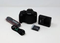 An as new Canon EOS 2000D DSLR Camera Body with strap, battery, charger (requires UK plug adaptor)