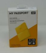 A boxed as-new WD My Passport 3TB Portable Auto Backup Hard Drive. Box sealed.