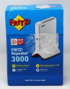 A boxed as new AVM FRITZ! Repeater 3000 Network Repeater (Box sealed, cosmetic damage to box).