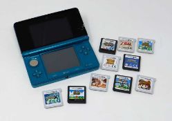 A pre-owned Nintendo 3DS in Aqua Blue with 10 assorted games in a carrying case (Sold without