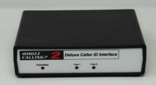 A pre-owned Whozz Calling 2 Deluxe Caller ID Interface (boxed with power supply and manual