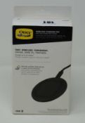A boxed as new Otter Wireless Charging Pad in Black (Box opened, some cosmetic damage to box).