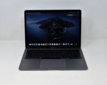 A pre-owned Apple MacBook Pro 13