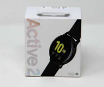 A boxed as new Samsung Galaxy Active2 SM-R820 44mm Aluminium Smart Watch in Black (Box sealed).