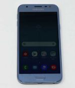 A pre-owned Samsung Galaxy J3 2017 SM-J330FN 16GB in Blue Silver (FRP clear, some light cosmetic