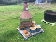 Chiminea with garden pots
