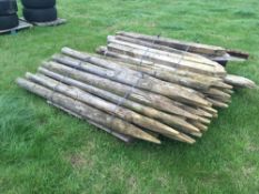 Quantity wooden fence posts