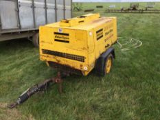 Atlas Copco trailed air compressor with diesel engine and pipes. Hours: 1926