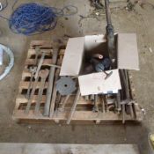 Pallet of iron bars and hand tools