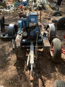 Lister engine turns by hand on trailed base, 1.8m long, 1.5m wide. Stored near Thetford, Norfolk.