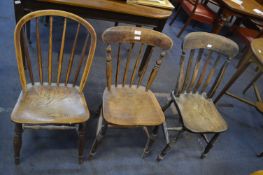 Three Country Chairs with Spindle Backs and Elm Se