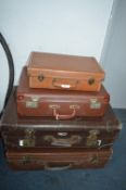 Four Vintage Suitcases