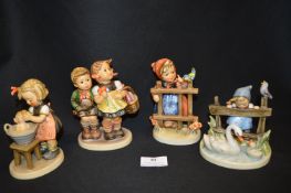 Four Goebels Figures