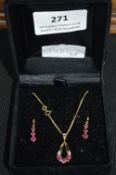 9ct Gold Earrings and Pendant with Red Inclusions