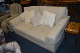 Cream Upholstered Two Seat Sofa