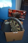 Box of Household Goods Including Dartboard, etc.
