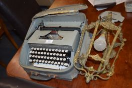 Remington Travel Riter Deluxe Typewriter, and a Br
