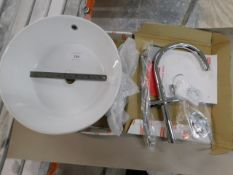 * Counter top round wash basin with Franke Rigi Tap