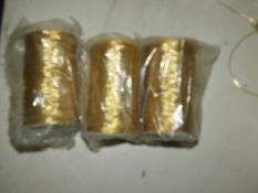 *Three 100m Rolls of Gold Elastic Thread