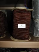 *Three Rolls of Brown Elastic