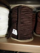 *Three Rolls of Brown Elastic