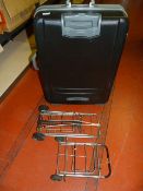 Suitcase and Two Trolleys