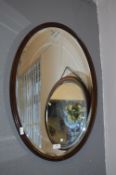 Mahogany Oval Bevelled Edge Wall Mirror