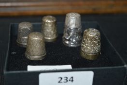 Five Silver Thimbles