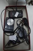 Sony Digital Camera and a Binatone Mobile Phone