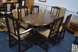 Dark Oak Oval Dining Table with Six Floral Upholst