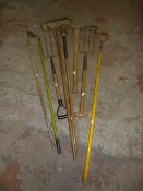 Bundle of Tools Including Forks, Pickaxe, Hose, et
