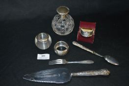 Tray Lot of Silver Items; Napkin Rings, Cut Glass Bottle, Match Striker, Cutlery, etc.