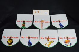 Seven Guinness Pub Shelf Advertisements