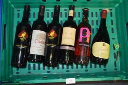 Five Bottles of Red Wine and a Bottle of Rose