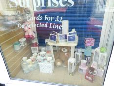 Contents of The Window Display to Include Assorte