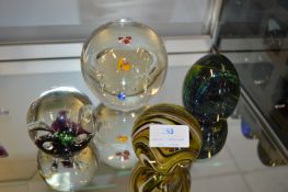 Four Glass Paperweights