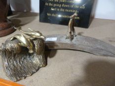 *Brass Dolphins and an Ornamental Bridge